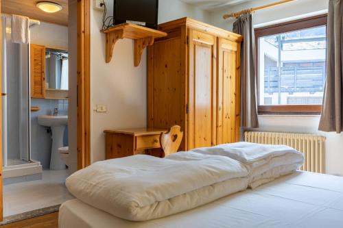 Postel nebo postele na pokoji v ubytování Hotel Meuble' Joli