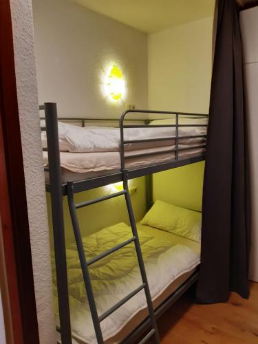 a couple of bunk beds in a room at Aschenputtel in Altenau