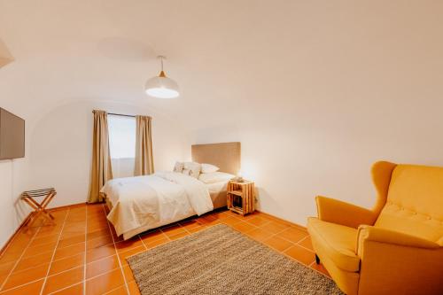 Ein Bett oder Betten in einem Zimmer der Unterkunft Landgut Riegerbauer