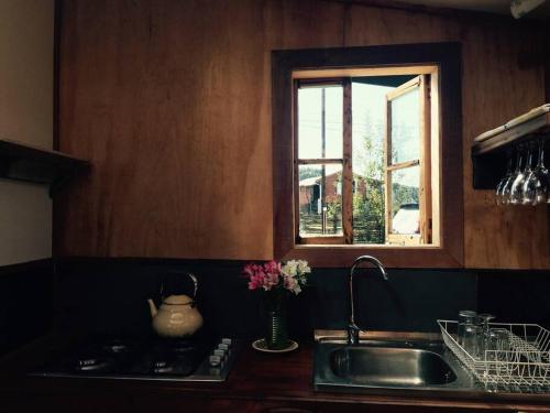 Kuchyň nebo kuchyňský kout v ubytování Casa Chakana Chiloé