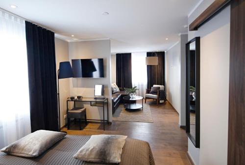 Televiisor ja/või meelelahutuskeskus majutusasutuses Keflavik Micro Suites
