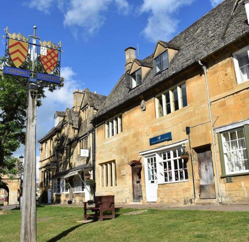 an old building with a sign in front of it at Little Campden House in Chipping Campden