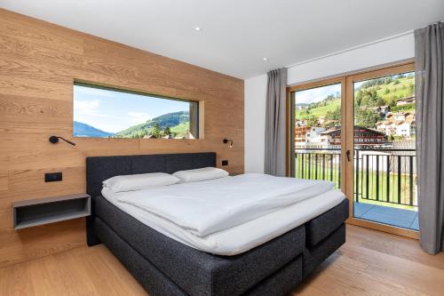 Кровать или кровати в номере Residence Catarina Lanz