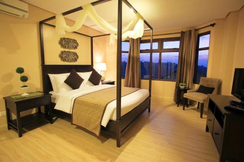 Postel nebo postele na pokoji v ubytování Crosswinds Resort Suites