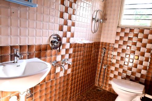 Ванная комната в Naturesky Homestay - Full Villa, Home Food & Coffee Estate