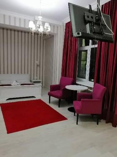 Posezení v ubytování Apart Hotel Триумф Астаны 22 этаж, Секция 2
