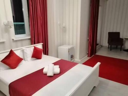 Postel nebo postele na pokoji v ubytování Apart Hotel Триумф Астаны 22 этаж, Секция 2