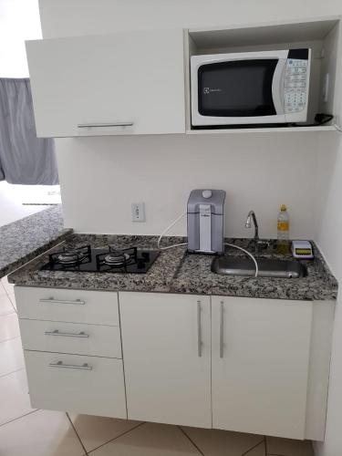 Kuchyň nebo kuchyňský kout v ubytování Spot Residence São Carlos 700m da USP