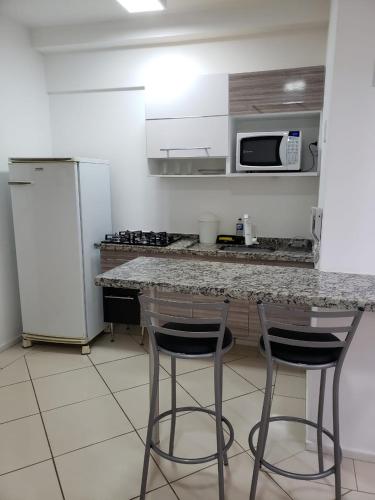 Kuchyň nebo kuchyňský kout v ubytování Spot Residence São Carlos 700m da USP