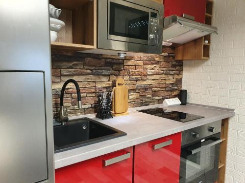 Kuchyň nebo kuchyňský kout v ubytování LANE Tiny Homes, nahe Hannover Messe