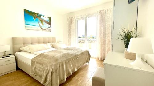 Ένα ή περισσότερα κρεβάτια σε δωμάτιο στο Apartment Green Garden