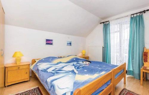 Apartman Svetličić tesisinde bir odada yatak veya yataklar