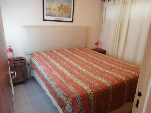 Posteľ alebo postele v izbe v ubytovaní Villa Gesell zona norte pinar cerca playa