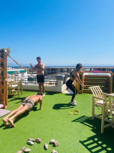 a group of people playing on the roof of a ship at Swiss Royal DAHAB in Dahab