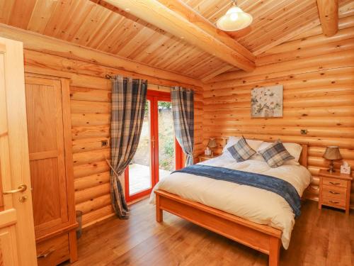 Llit o llits en una habitació de Maple Lodge