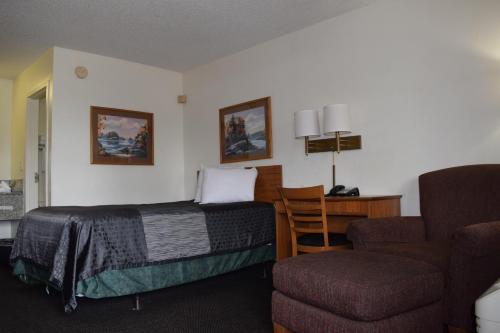 Χώρος καθιστικού στο Value Inn - Livonia