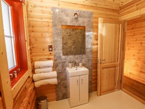 Kupaonica u objektu Rowan Lodge