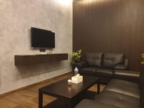 TV a/nebo společenská místnost v ubytování D Wayfarer Inn Resort