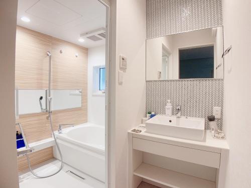 Ein Badezimmer in der Unterkunft HOTEL CLA-SS HIROSHIMA-TOKAICHI
