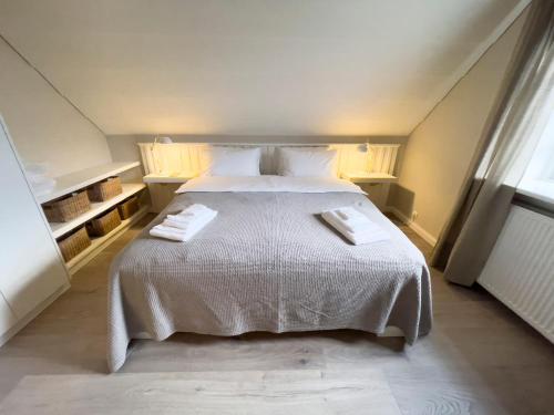 Cama o camas de una habitación en Kristinsson Apartments