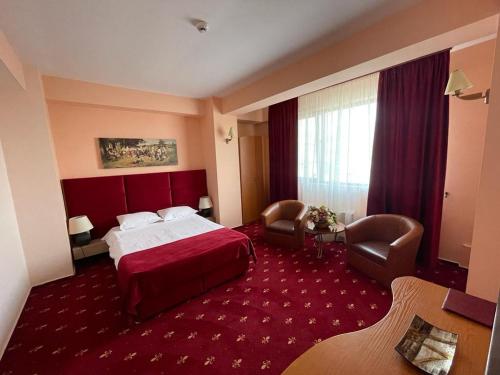 Una cama o camas en una habitación de Hotel Class
