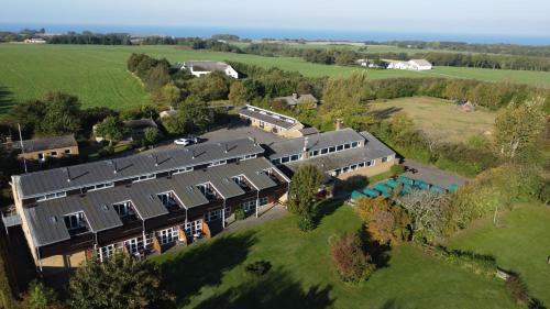 an overhead view of a building in a field at Nordbornholms Feriecenter in Hasle