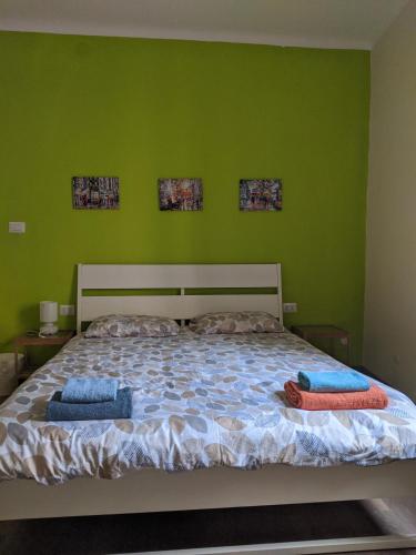 a bedroom with a bed with two pillows on it at Verbania Centro Storico 2 camere in Verbania