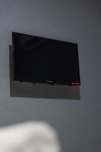 Chariton Hotel Baganにあるテレビまたはエンターテインメントセンター