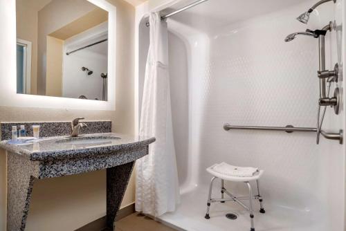 a bathroom with a sink and a shower at Comfort Suites Vicksburg in Vicksburg