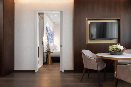 Телевизор и/или развлекательный центр в Eurostars Universal Lisboa