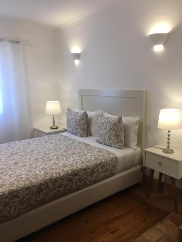 
A bed or beds in a room at Guarda Rios
