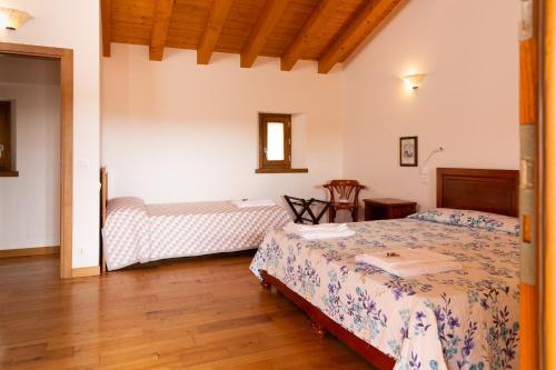 Voodi või voodid majutusasutuse Albergo Diffuso Polcenigo Casa Blas toas