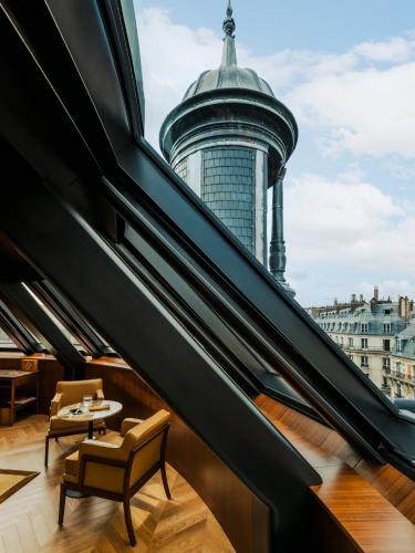 a stairway with a view of a building at Hôtel Madame Rêve in Paris