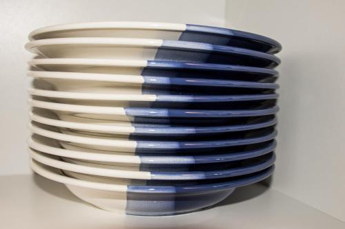 a stack of plates stacked on top of each other at Haus Bott in Hilders