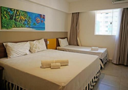 Llit o llits en una habitació de Apartamento Olímpia Resort