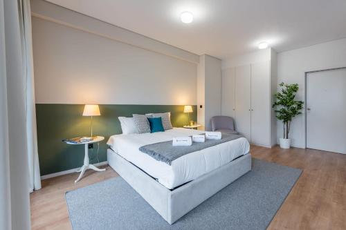 Een bed of bedden in een kamer bij GuestReady - Pleasant Boavista