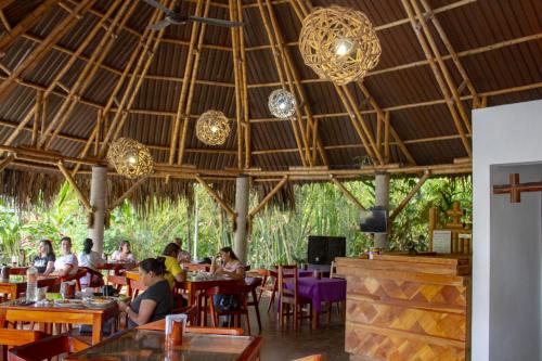 Restaurace v ubytování AXKAN PALENQUE, SHOWS EN VIVO & GASTRONOMIA MAR y TIERRA & TRAVEL AGENCY