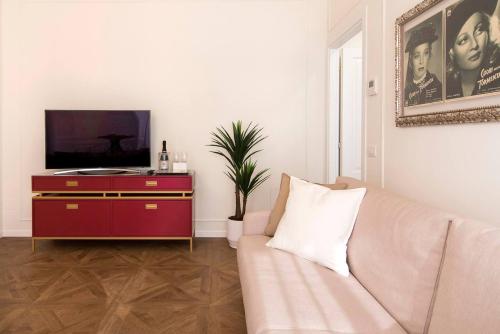 Télévision ou salle de divertissement dans l'établissement Madonna Montecchi Luxury Suite in Verona
