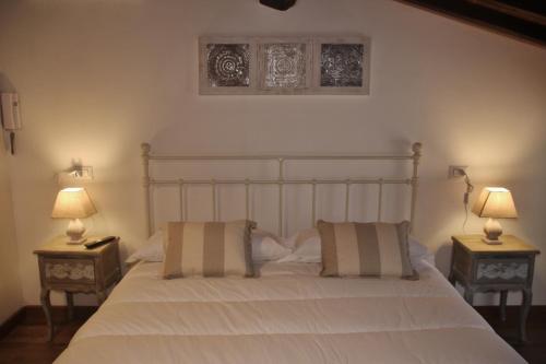 Maison del Borgo 객실 침대
