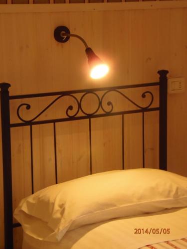 Katil atau katil-katil dalam bilik di B&B La Villa