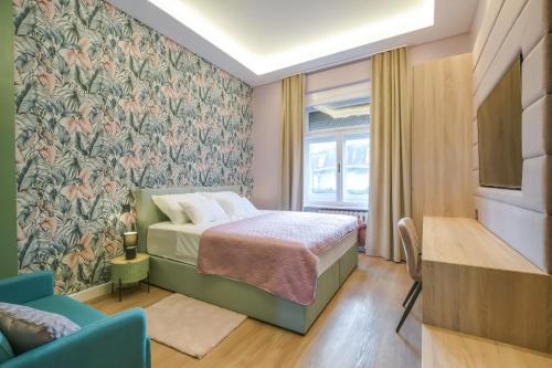 Giường trong phòng chung tại Royal residence Zagreb