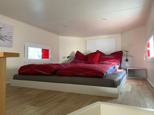 Postel nebo postele na pokoji v ubytování Ferienhaus Tiny Löwenzahn