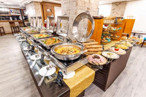 a buffet line with many different types of food at Sonesta Hotel Loja in Loja