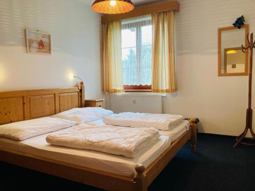 Кровать или кровати в номере Horní Kout