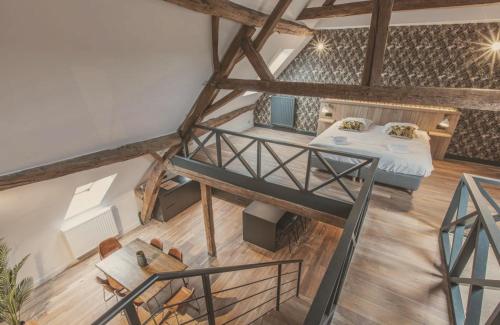 an overhead view of a bedroom with a bunk bed at Domaine Sur Les Sarts in Ohey