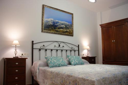 Ліжко або ліжка в номері Casa Rural Sierra de las Nieves