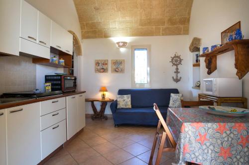 A kitchen or kitchenette at Magico Salento 1/2/3