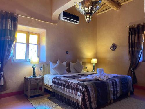 Cama o camas de una habitación en Riad Paradise of Silence