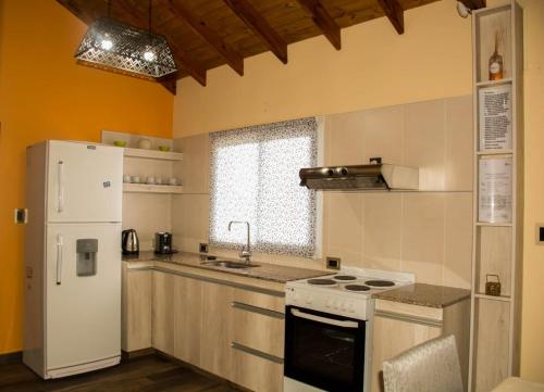 Köök või kööginurk majutusasutuses Cabañas Juan Pedro