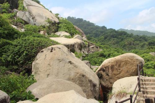 a group of large rocks on a mountain at HOSTAL MIRADOR dentro del parque tayrona in El Zaino